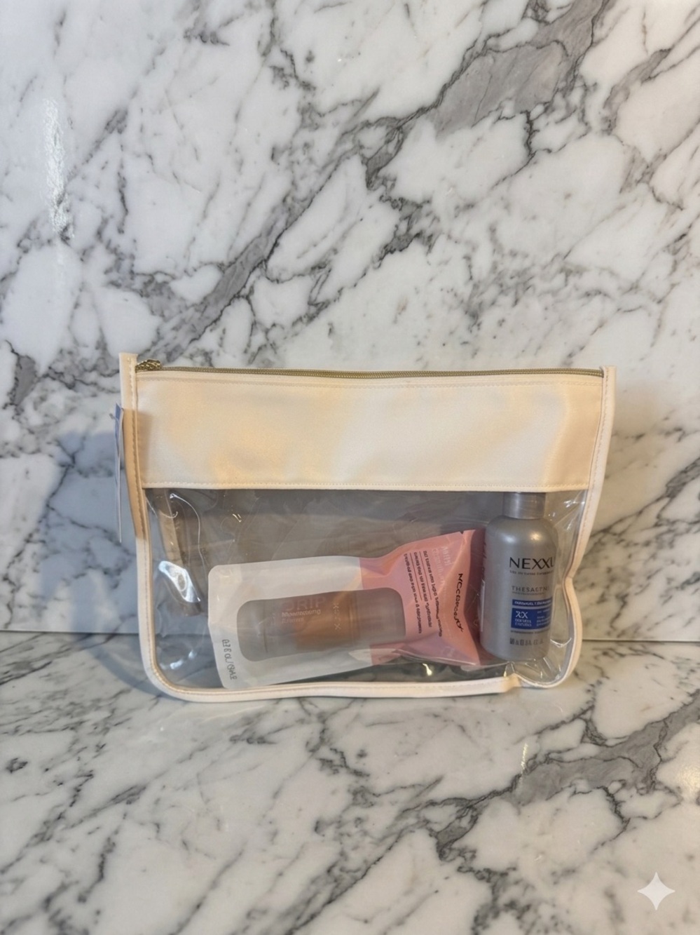 Clear Toiletry Travel Bag nexxus shampoo & mccbeauty glow